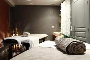 Postel nebo postele na pokoji v ubytování Hôtel Antares & Spa