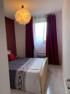 Postel nebo postele na pokoji v ubytování Comme à la maison - Chambre double chez habitant près de Toulouse