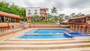 สระว่ายน้ำที่อยู่ใกล้ ๆ หรือใน Casa Nova Hotel Campestre