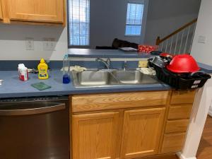 a kitchen counter with a sink and a dishwasher at 37100 turnstone circle in Rehoboth Beach