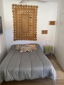 Postel nebo postele na pokoji v ubytování Apartamento Los Escullos Acantilado