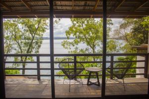 A balcony or terrace at G Boutique Hotel at San Andres Peten