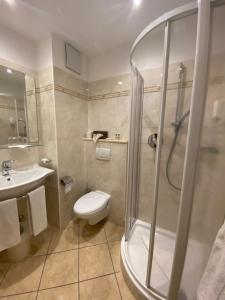 Koupelna v ubytování Hotel Castel Latemar + 37 fotografií