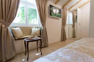 Posteľ alebo postele v izbe v ubytovaní Summer Dream Studio