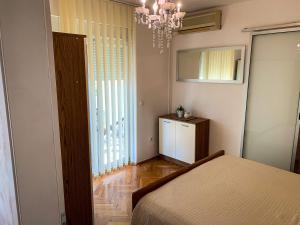Postel nebo postele na pokoji v ubytování Apartments Gurman