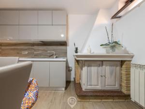 Kuchyňa alebo kuchynka v ubytovaní Villa Monica - Suite Scirocco
