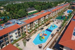 an overhead view of a resort with two pools at Ondas Praia Resort in Porto Seguro