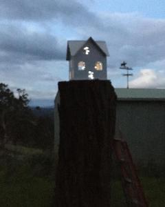 
a clock tower with a clock on top of it at Springmead B&B in Rydal

