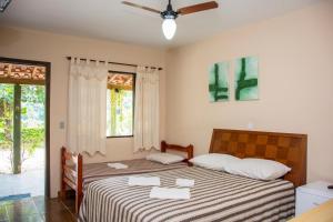 Voodi või voodid majutusasutuse Hotel Fazenda Monte Sião toas