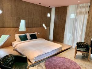 Posteľ alebo postele v izbe v ubytovaní Rice Field Homestay