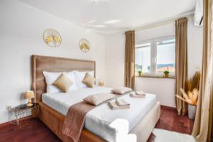 Posteľ alebo postele v izbe v ubytovaní Luxury Villa Ivana