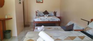 Postel nebo postele na pokoji v ubytování JPH Resort