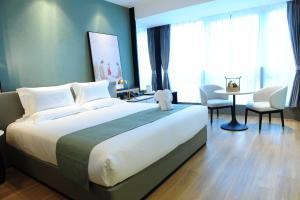 Fotografie z fotogalerie ubytování Dexin Fuyuan Hotel v destinaci Xiaoshan