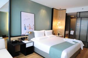 Fotografie z fotogalerie ubytování Dexin Fuyuan Hotel v destinaci Xiaoshan