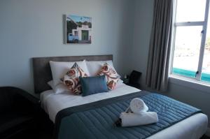 Voodi või voodid majutusasutuse The Amberley Hotel toas