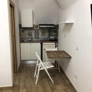 Кухня или мини-кухня в Brancaccio’s House
