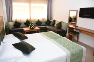 Postel nebo postele na pokoji v ubytování Hotel Residence Imiplage