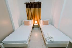 Postel nebo postele na pokoji v ubytování TARASA HOSTEL