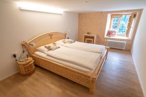Postel nebo postele na pokoji v ubytování Hotel Wasserfall