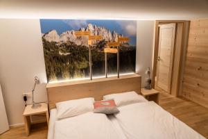 Postel nebo postele na pokoji v ubytování Hotel Wasserfall