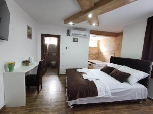 Voodi või voodid majutusasutuse Sobe i Apartmani Casa Mia toas
