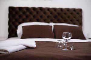 Rúm í herbergi á Sobe i Apartmani Casa Mia