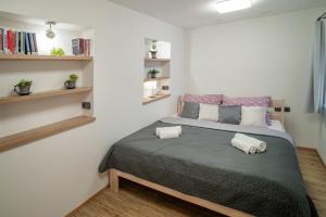 Postel nebo postele na pokoji v ubytování Hotel Smrž