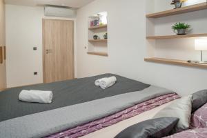 Postel nebo postele na pokoji v ubytování Hotel Smrž