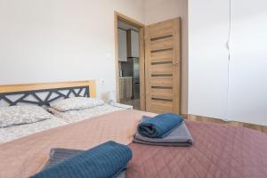 Posteľ alebo postele v izbe v ubytovaní Urban Jungle - Lara Apartment