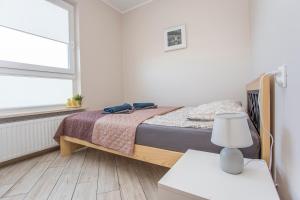 Posteľ alebo postele v izbe v ubytovaní Urban Jungle - Lara Apartment