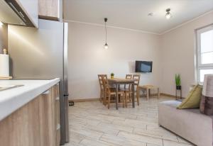 Kuchyňa alebo kuchynka v ubytovaní Urban Jungle - Lara Apartment
