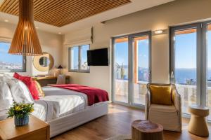 Postel nebo postele na pokoji v ubytování Anamar Destino Mykonos