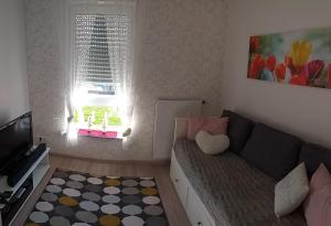 TV a/nebo společenská místnost v ubytování Haus Zangerle