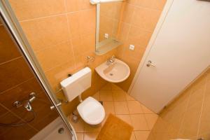 Kúpeľňa v ubytovaní Apartmani Pašalić