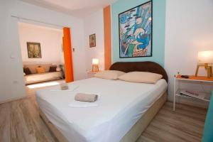 Posteľ alebo postele v izbe v ubytovaní Apartmani Pašalić