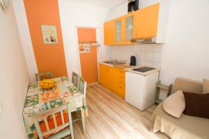 Kuchyňa alebo kuchynka v ubytovaní Apartmani Pašalić