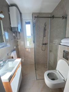 Koupelna v ubytování Goga Apartmani + 13 fotografií