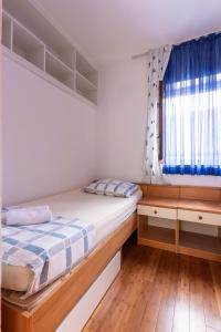 Posteľ alebo postele v izbe v ubytovaní Apartments Zdena