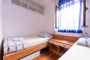Posteľ alebo postele v izbe v ubytovaní Apartments Zdena