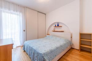 Posteľ alebo postele v izbe v ubytovaní Apartments Zdena