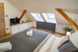 Postel nebo postele na pokoji v ubytování Hotel Smrž