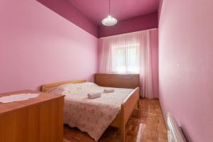 Posteľ alebo postele v izbe v ubytovaní Apartments Zdena