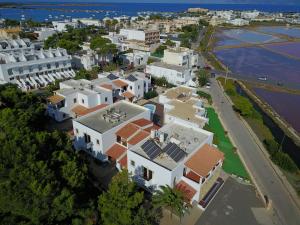 an overhead view of a city with white houses at Apartamentos Mar y Sal in La Savina