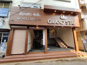 a grand canyon grand sign on the front of a building at Hotel Grand Stay in Tiruchchirāppalli
