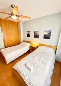 Posteľ alebo postele v izbe v ubytovaní RESIDENCIAL NOVA OROPESA REF 016