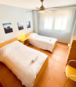 Posteľ alebo postele v izbe v ubytovaní RESIDENCIAL NOVA OROPESA REF 016