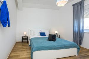 Posteľ alebo postele v izbe v ubytovaní Villa Dika Nin