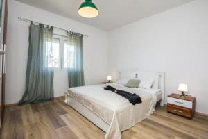 Posteľ alebo postele v izbe v ubytovaní Villa Dika Nin
