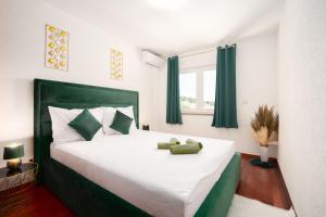 Posteľ alebo postele v izbe v ubytovaní Luxury Villa Ivana