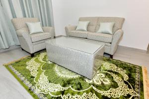 Χώρος καθιστικού στο Summit Hotel Suites - القمة للأجنحة الفندقيه